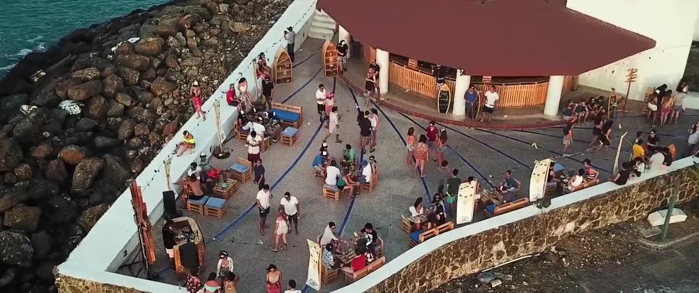 Aerial view of the Casablanca terrace packed with people by the sea
