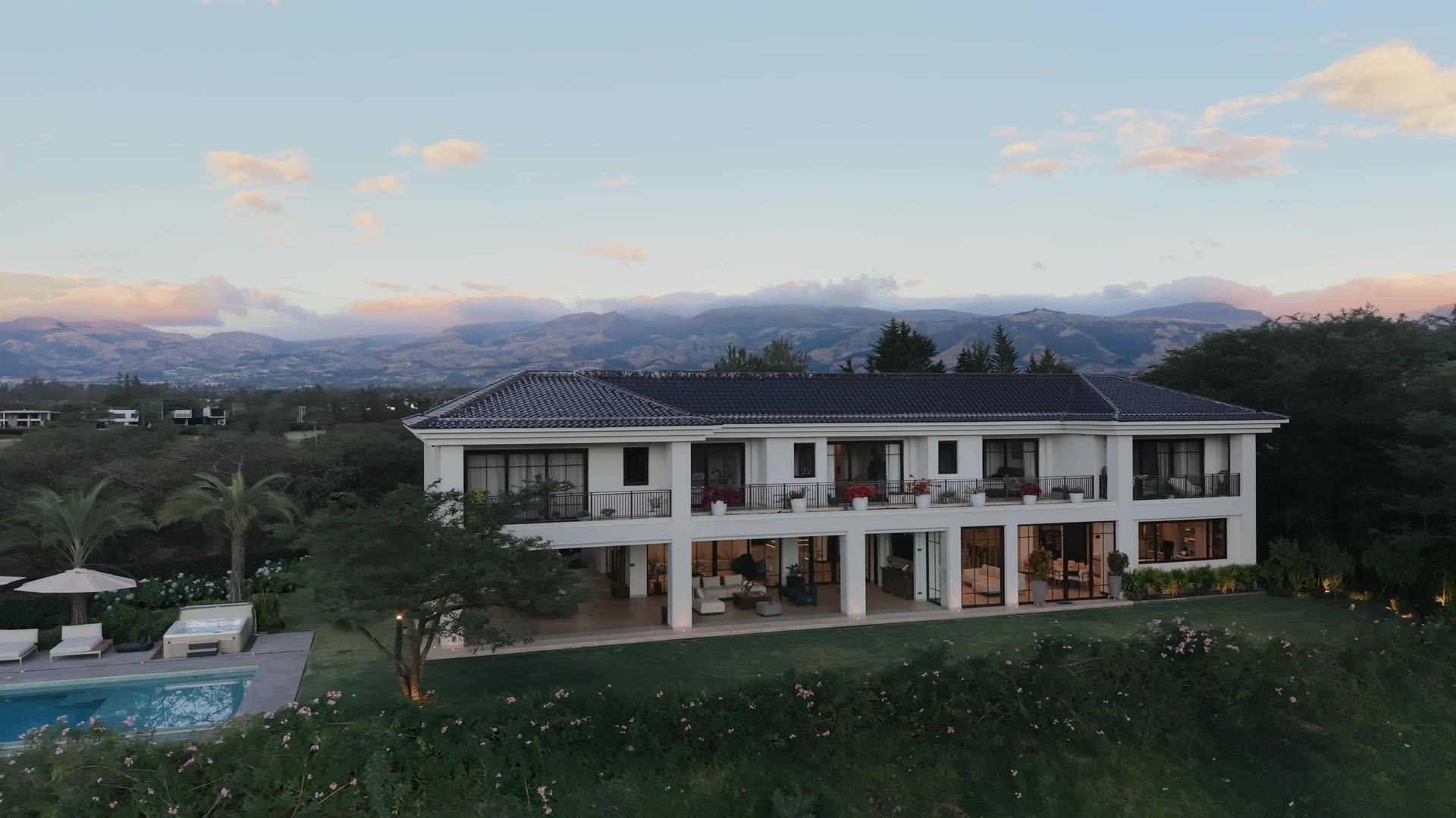 Casa GH at sunset, with the valley and mountains behind