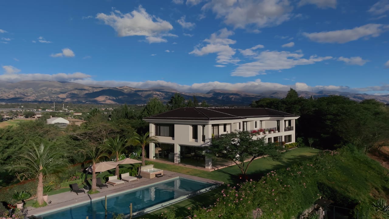 Casa GH and its pool overlooking the Puembo valley, seen from the air